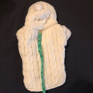 Small cream colored dog sweater